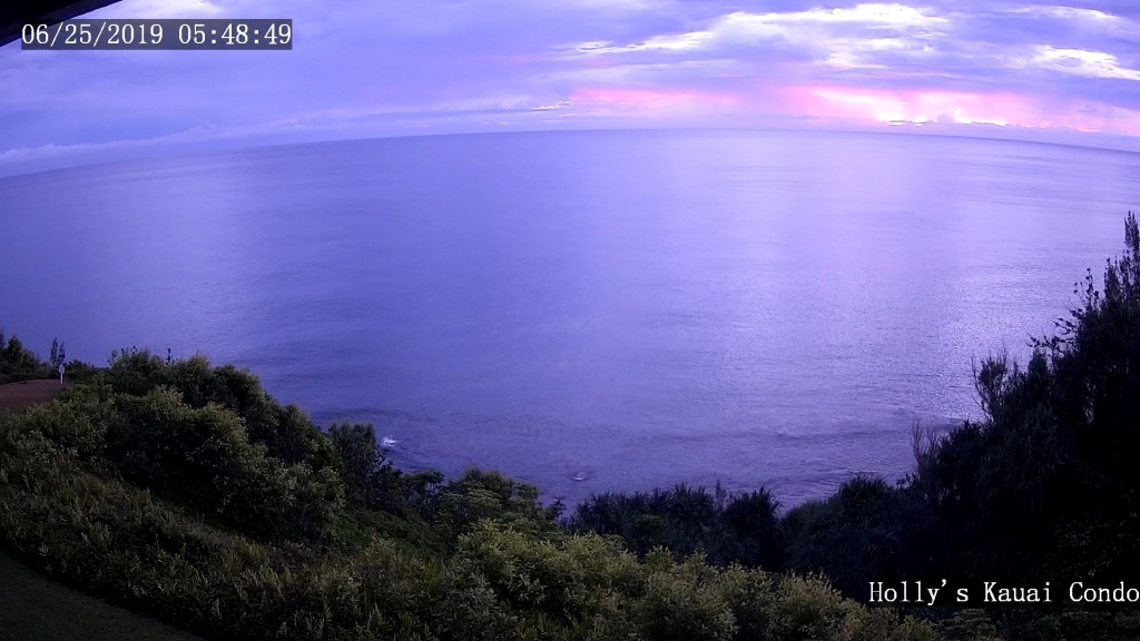 Striking purple and pink oceanfront sunrise captured by lanai's web cam.